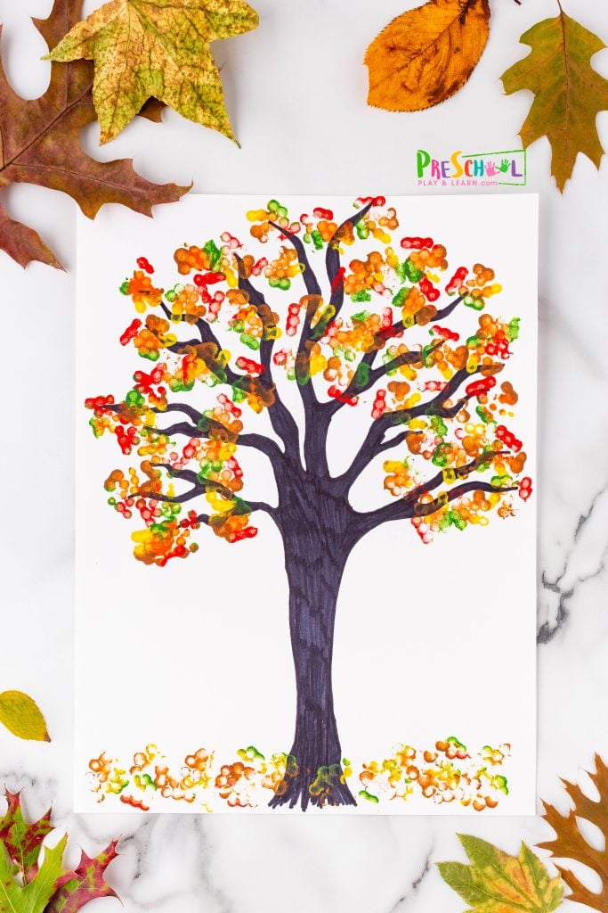 This activity not only yields stunning results, but it's also incredibly easy for preschoolers to master. They'll absolutely love the creative painting technique we'll use to bring their autumn trees to life!