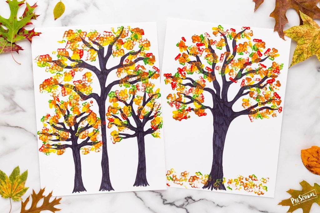 Check out this adorable and easy q-tip painted fall tree craft! This project is a must autumn tree crafts for preschoolers!