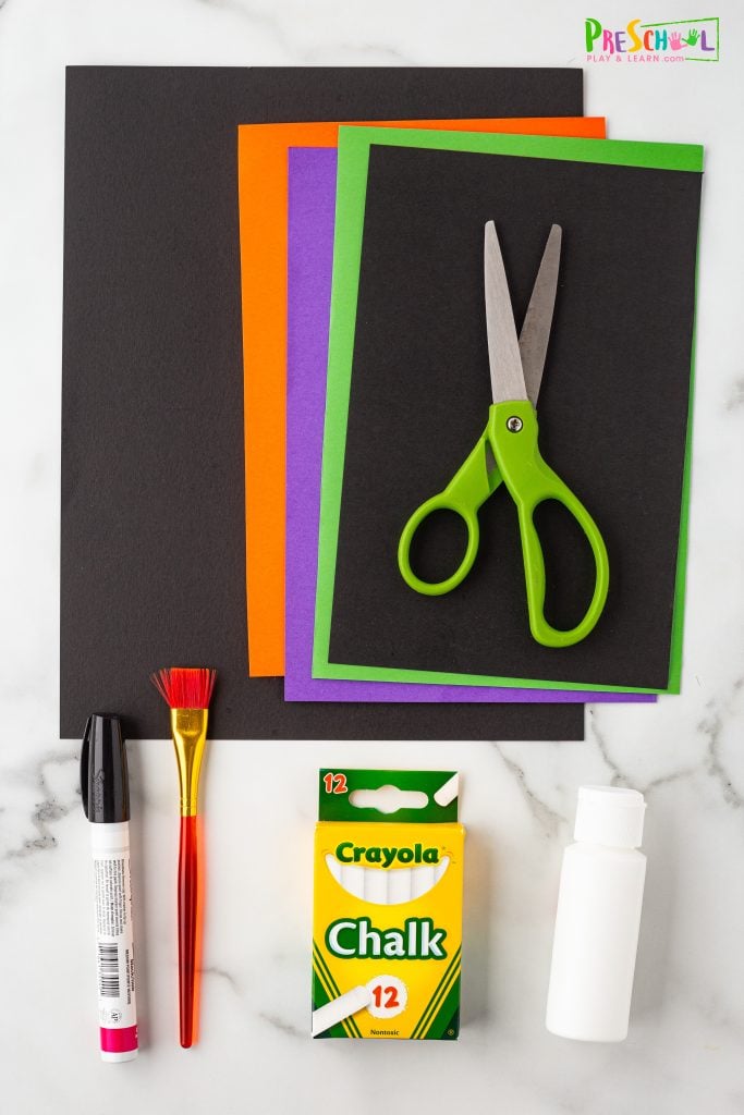 Here are the supplies you need to try this project:

non-toxic white paint
black acrylic paint
paint brush
black marker
cardstock (in your choice of colors)
chalk
scissors