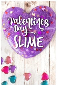 Get ready for some serious fun when you whip up a batch of thsi Glittery, Purple Valentine Slime. This Valentines Day Slime recipe usese contact solution and baking soda for a quick, easy, and perfect-every-time slime recipe for kids. We love whipping up a batch of this valentines slime for a kid favorite valentine's day preschool activities for toddler, preschool, pre-k, kindergarten, first grade, and 2nd graders. 